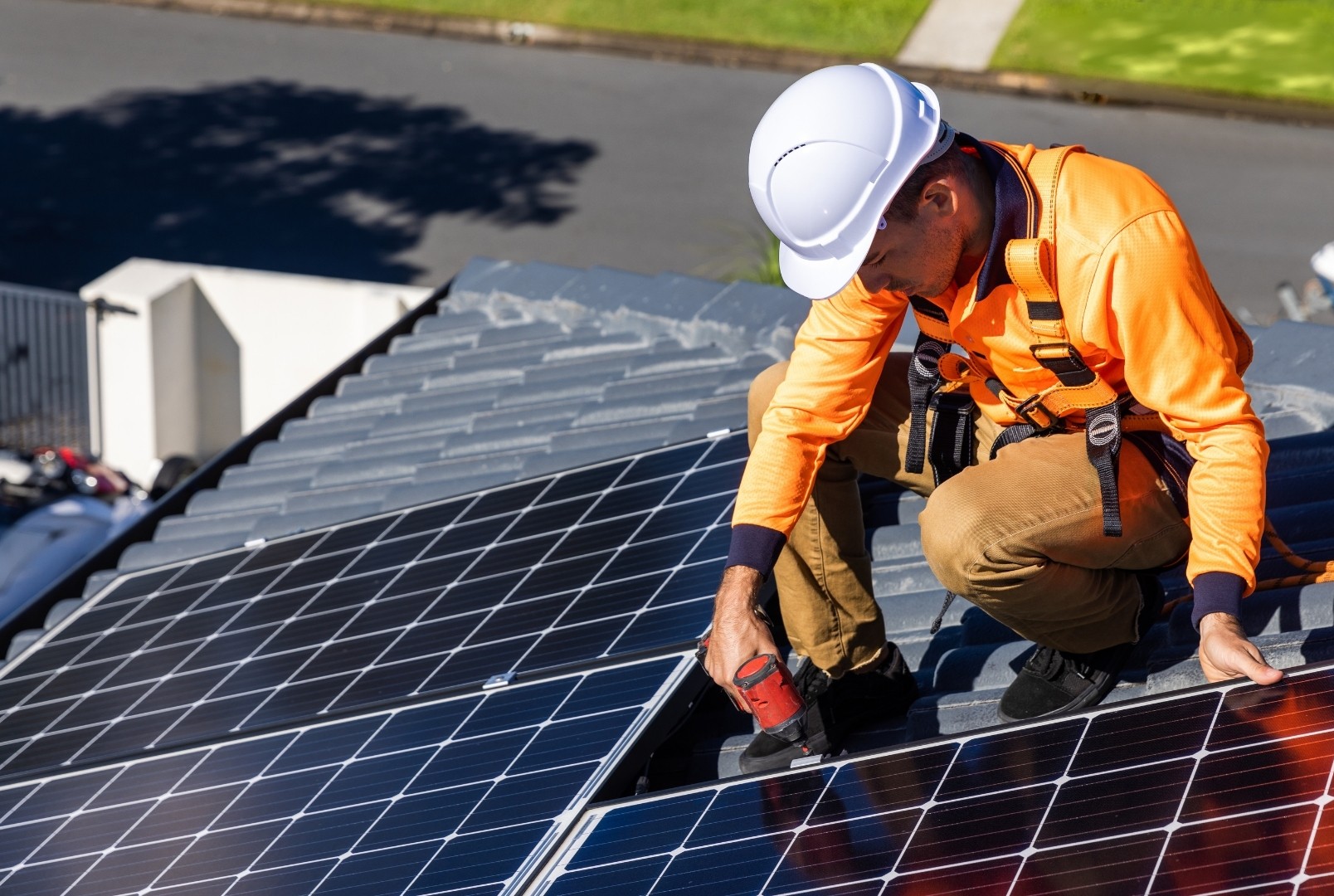 Technician installing solar panels
